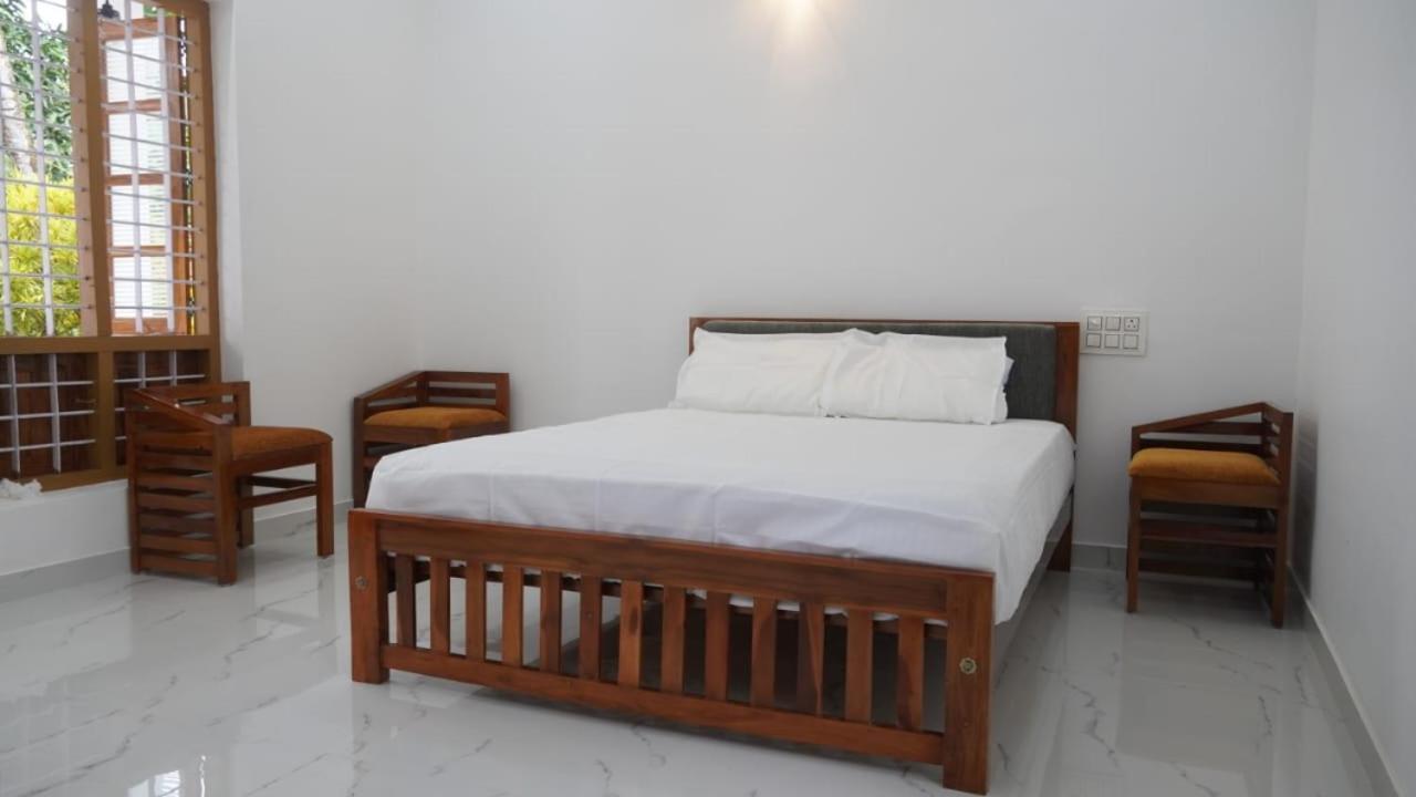 Munroe Heritage Inn Mundrothuruth Номер фото